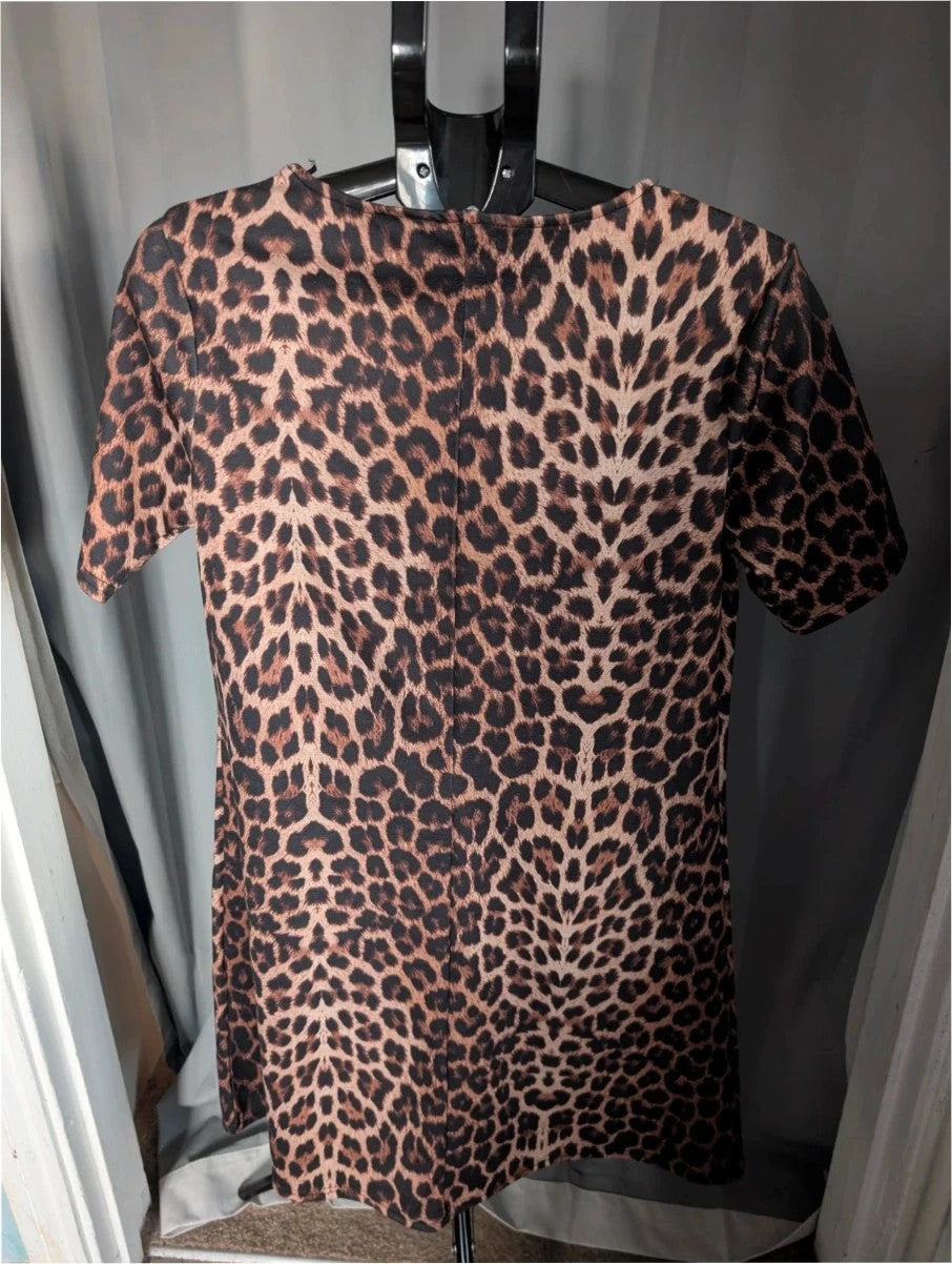Peacocks leopard print shift mini dress in black and brown with short sleeves and scoop neckline.