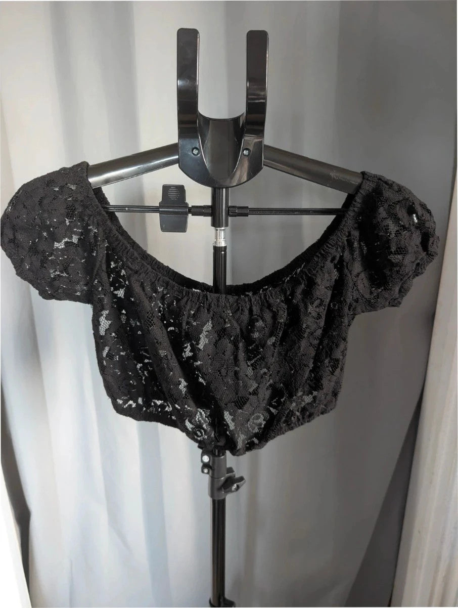 ASOS black sheer floral lace crop top with off-the-shoulder Bardot neckline and puff sleeves.