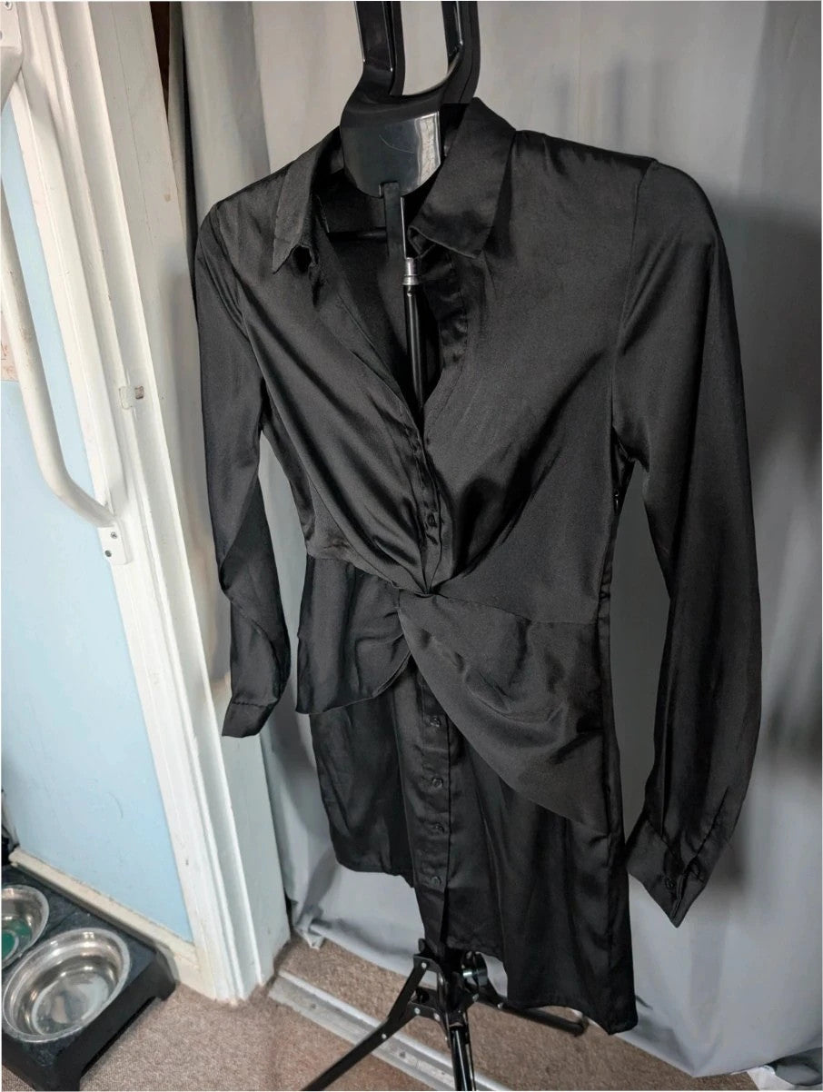 Stradivarius black satin pencil dress with twist front, collared V-neck, and long sleeves.